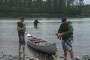 Cpl Campbell helps Tpr Hauck and Tpr Wagner get out of the water