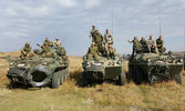 Members of Recce Sqn and 4/3rd Cavalry Regiment adopting tactical vehicle positions Credit: Cpl Mijares, Recce Squadron.