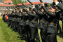 Cpl Mackenzie MacLeod along with the remainder of the 2nd Guard preparing to fire their weapons as part of the Feu de Joie as part of the ceremonies held at Spruce Meadows Queen Elizabeth II Cup.