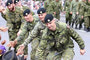 B Squardon’s 100-man guard marching in the Calgary Stampede Parade high-fiving the crowd as they showed their support for the troops.