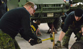 Cpl Brydon Townsend; Cpl Andrew Radford building track