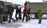 Cpl Reid and WO Lefebvre setting up the MKT with MCpl VanHeerden trying his best to be a TV host.