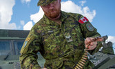 Cpl Howard “Howie” Wright carefully sorting rounds as the Ammo NCO during ready week ranges.