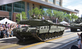 Crews of Leopard 2 Tank saluting the CO and RSM during Stampede Parade, 8 July 2016, Calgary, Alta. Photo by Dave Olaes.