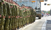 Crews of Leopard 2 Tank saluting the Regimental CO and RSM during Stampede Parade, 8 July 2016, Calgary, Alta. Photo by Dave Olaes.