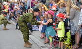 MCpl Emily Lavoie mingling with the crowd during Stampede Parade, 8 July 2016, Calgary, Alta. Photo by Dave Olaes.