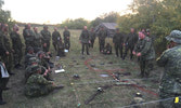 Sgt Joe Gushue and A Sqn Crew Commanders discuss Combat Team operations with members of 2nd Battalion PPCLI