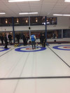 Mr John Morris providing instruction to members of the Strathcona Curling Team