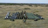 All of the enemy force, COEFOR, and OCTs of the Operations Group pose for a photo before the exercise begins.