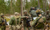 Members of Grizzly and Double Cross greet IAW COVID-19 measures. Credit Sgt Felipe Barandica, Spanish Army