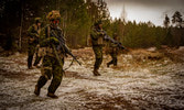 Members of call sign Stovepipe the reserve infantry mortars follow behind Double Cross as they advance. Credit Sgt Felipe Barandica, Spanish Army.