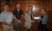 Left to right – John Stuckart, Tom Hoppe, BGen (Ret’d) Craig Hilton and recipient Megan Hoppe.