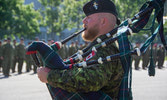 Cpl Davies on the pipes – Medals Parade
