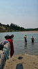 Photo taken by Cpl Chris Lawrence - Cpl Paquette escaping the heat with a dip in the river, companied by some tunes.