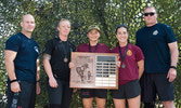 Ex MM 17 Top Three (Woman’s Classification) - Colonel William Fletcher (left), Commander of 1 Canadian Mechanized Brigade Group, and Chief Warrant Officer Darren Hessell (right), Brigade Sergeant Major, present Mountain Man Awards to (left to right) Capta