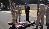 Ambassador of Canada to Lebanon, Ms. Emmanuelle Lamoureux, CO CTAT-L, Major Jack Nguyen, and Canadian Defence Attaché, LCol David Jones, observe the Combat First Aid Serial being taught to the LAF by Sgt Jesse Hall and MWO Raymond Morris. Photo by MCpl He