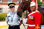 Ride Master, Warrant Officer James Clarke, dismounts after the parade to mingle with the RCMP cadets and civilians.