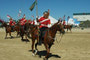 Cpl Travis Paskuski smiling as he leads his section through one of the rides many moves.