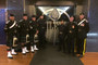 Pipes and drums band outside the Oilers locker room