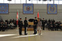 Pte Comeau receiving the Corporal Jamie Steeves Comradeship Award.  Left to right is MWO Holland, Pte Comeau, Maj McLaughlan, Mrs. Steeves.